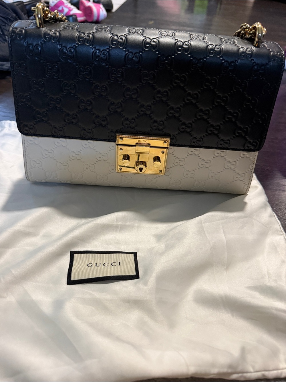Gucci Black and White Signature Leather Shoulder Bag with Gold Lock